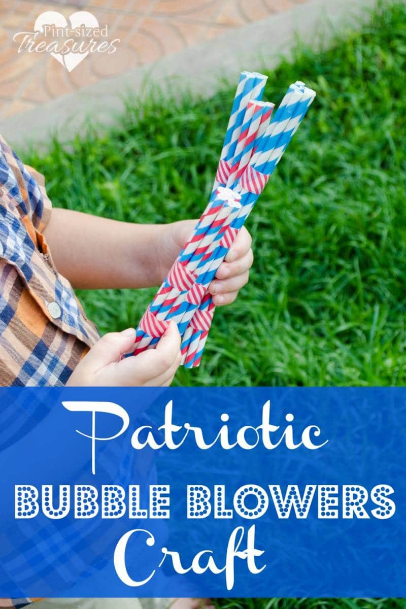 young child holding bubble blower craft