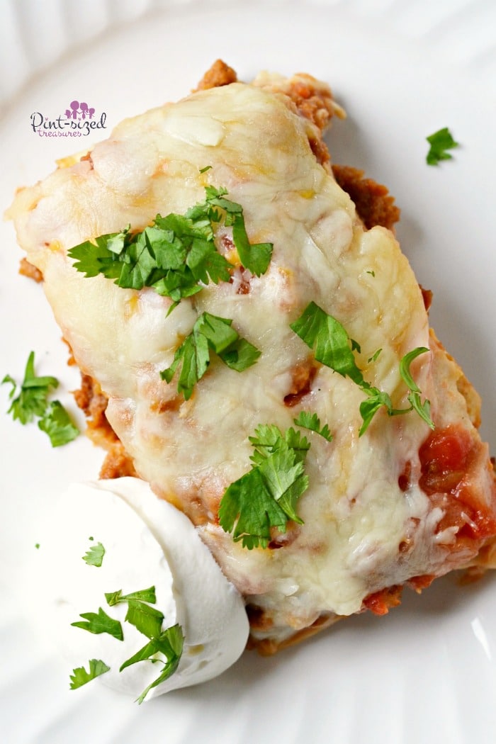 taco pie served with sour cream