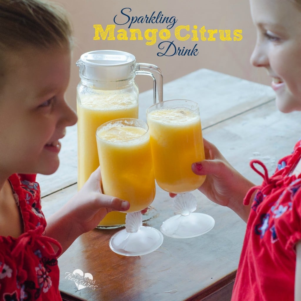 sparkling mango orange drink in glasses