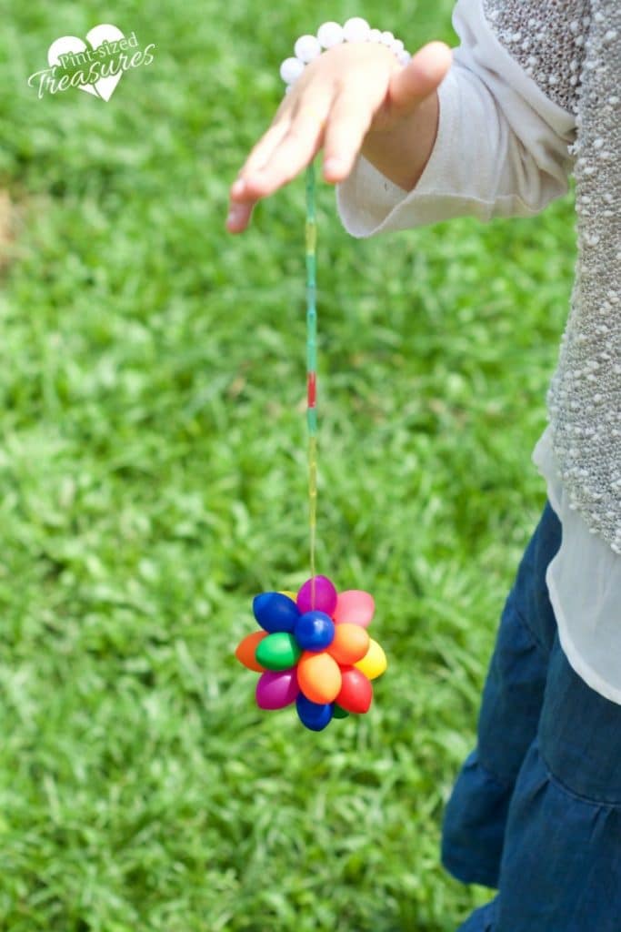 rainbow loom string added to rainbow sensory balloon balls