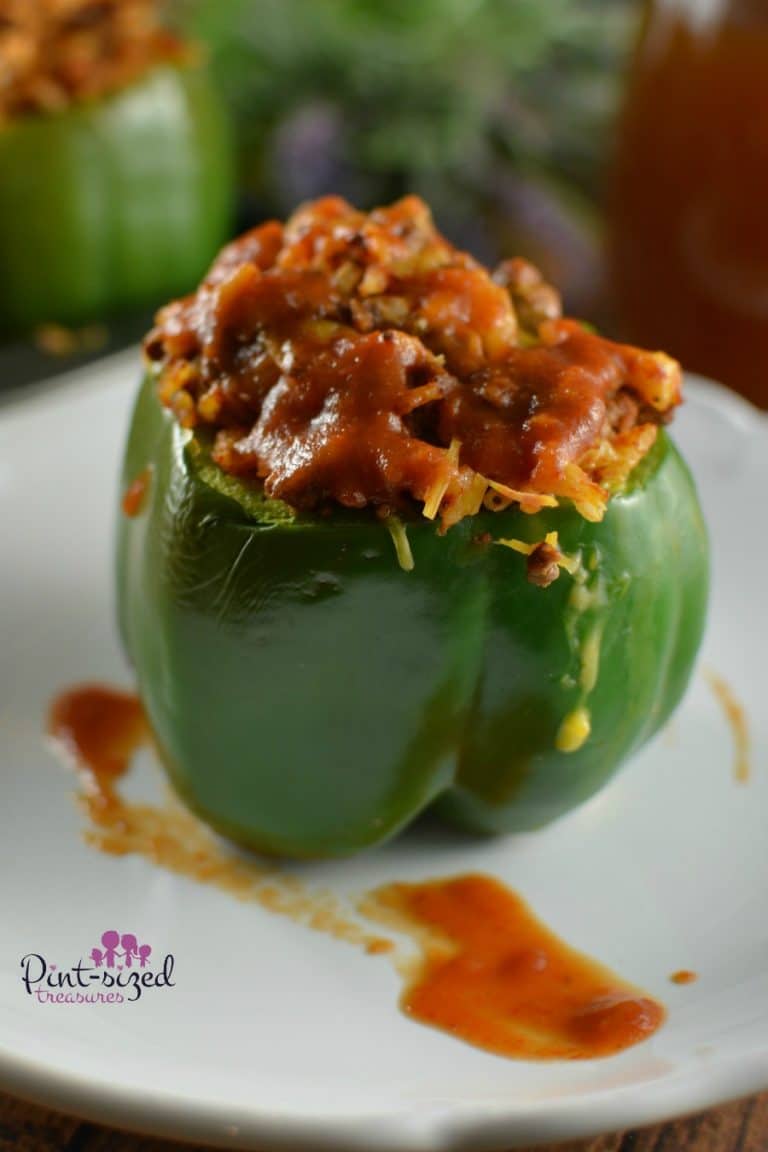 Gorgeous green peppers are loaded with a seasoned beef, tomato sauce and rice mixture. Top these off with cheddar cheese for an obey, gooey comfort food that everyone loves!