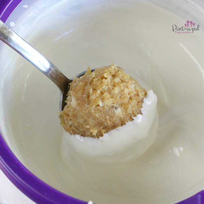 dipping truffles in white chocolate for banana nut bread truffles