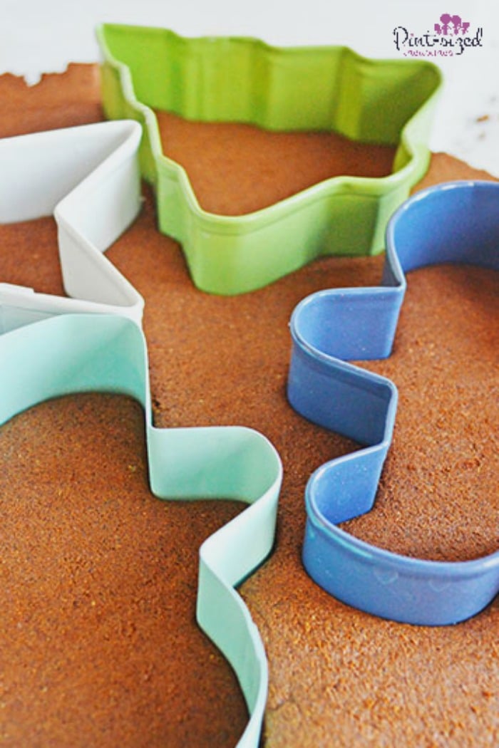 making cinnamon gingerbread men ornaments