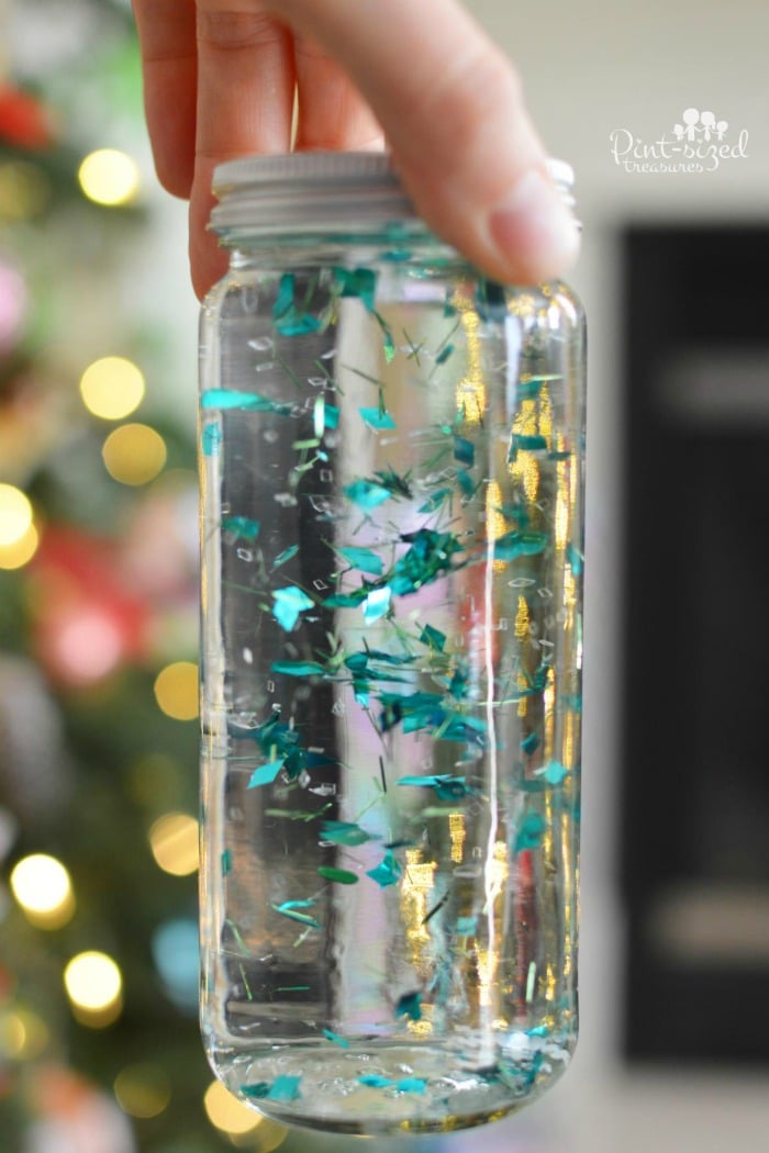 holding the homemade snow globe