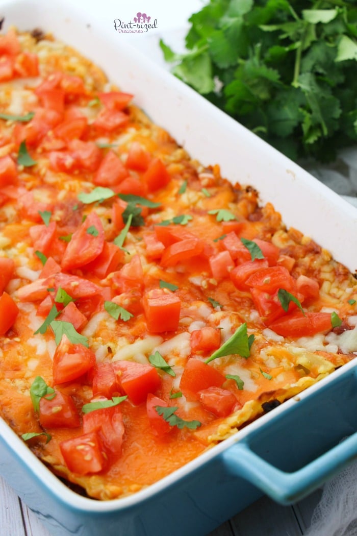 Our easiest taco lasagna bake recipe is hot from the oven and ready to eat! Print out the recipe!