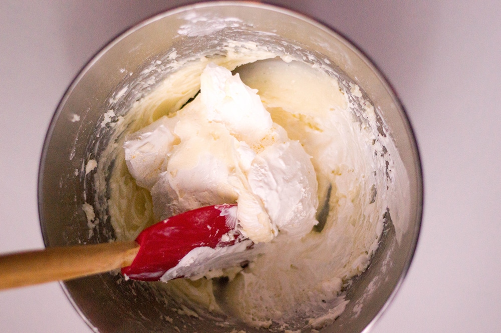 Mixing the cream cheesed sugars for the Oreo dessert