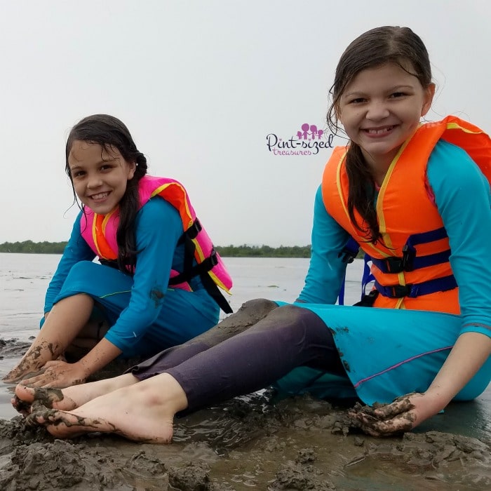 playing in sand in cambodia