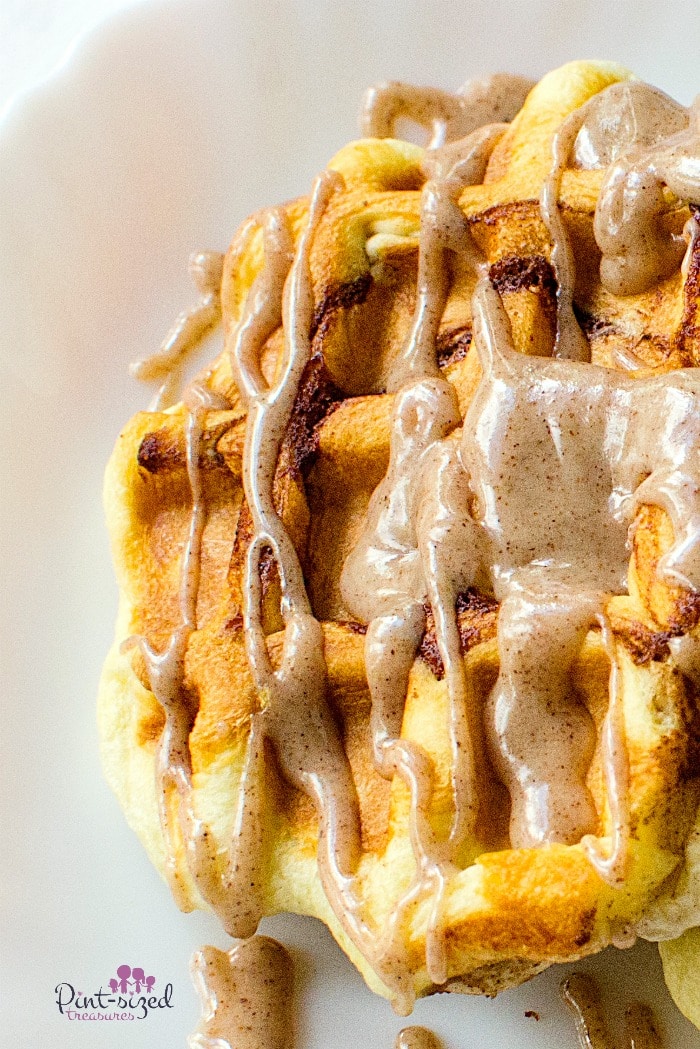 Pumpkin spice waffles is the perfect easy breakfast recipe during pumpkin season! You'll love the pumpkin glaze too! #easywaffles #Pumpkinwaflles #pumpkinrecipes #pumpkinseason #pumpkinpiespice