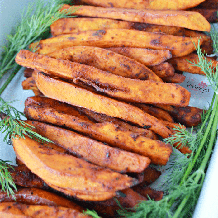 Spicy baked sweet potato fries that are simpleand taste amazing! Special blend of spices make these irresistable! #Spicybakedpotatoes #sweetpotatoes #sweetpotatofries #bakedpotatoes #spicyfood