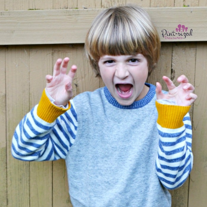 Roaring at a dinosaur themed play date.