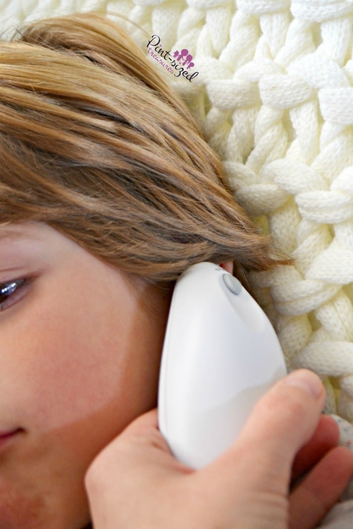 Checking temperature of sick child