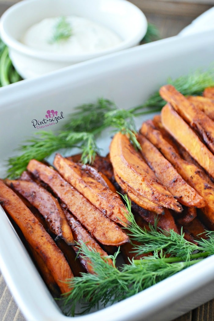 Easy sweet potato fries are baked, seasoned and SPICY! #bakedsweetpotatoes #sweetpotatofries #sweetpotatoes #bakedfries #easysides #easyrecipes #bestrecipes #homemadefries