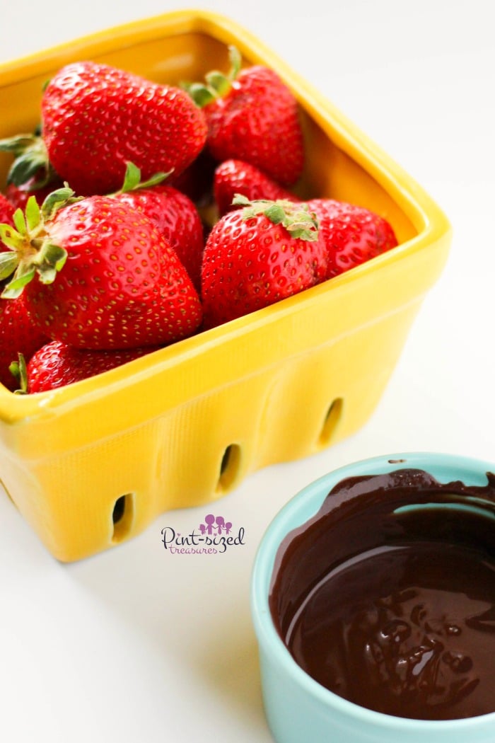 Dipping strawberries in chocolate