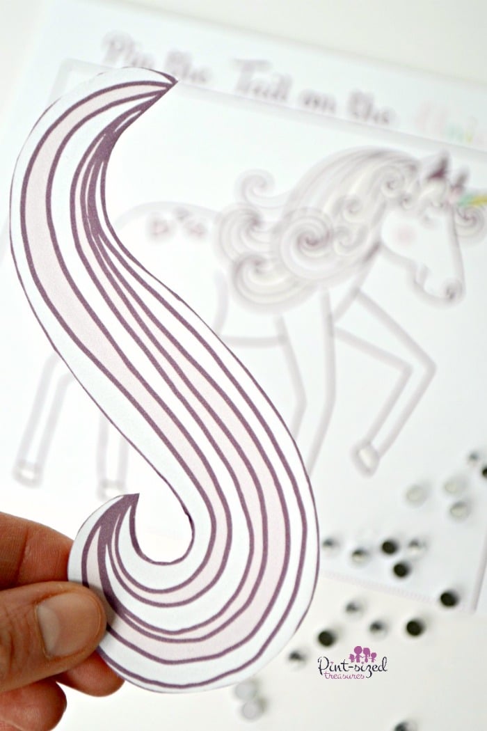 Pin the tail on the unicorn play date game
