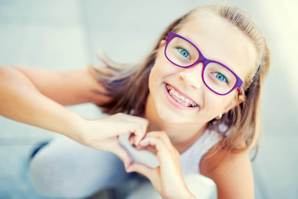 child smiling about a happy home