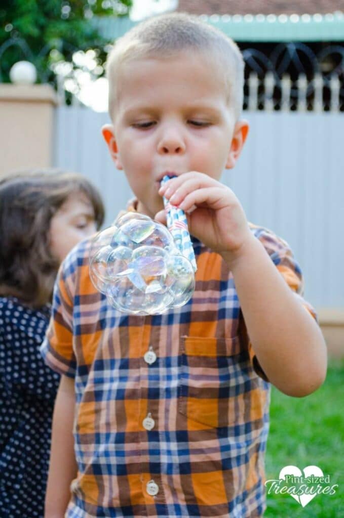 indoor kids activity blowing bubbles