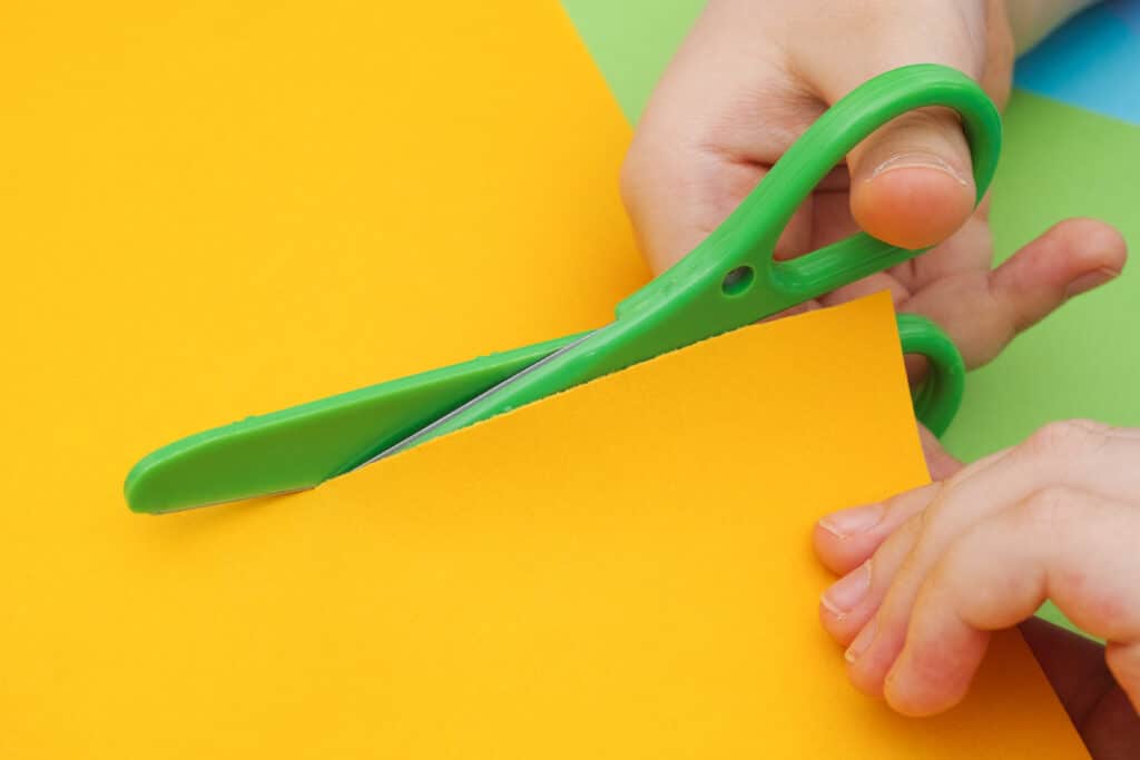 cutting paper during the homeschool day