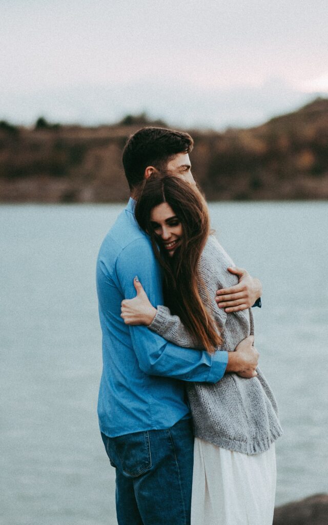 husband and wife hugging and holding each other to focus on loving each other more