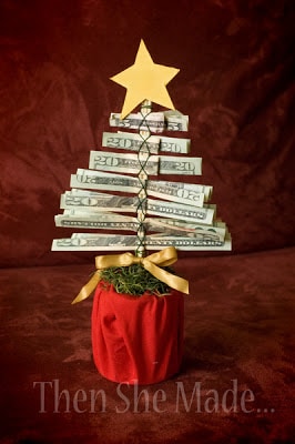 rolling cash into a money tree for a fun gift idea
