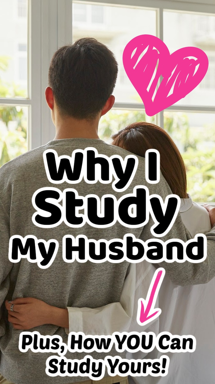 husband and wife looking out window as wife studies husband