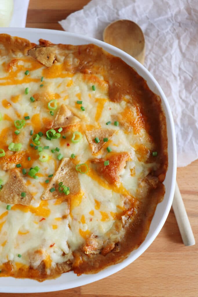 baked southwestern chicken taco casserole in white baking dish