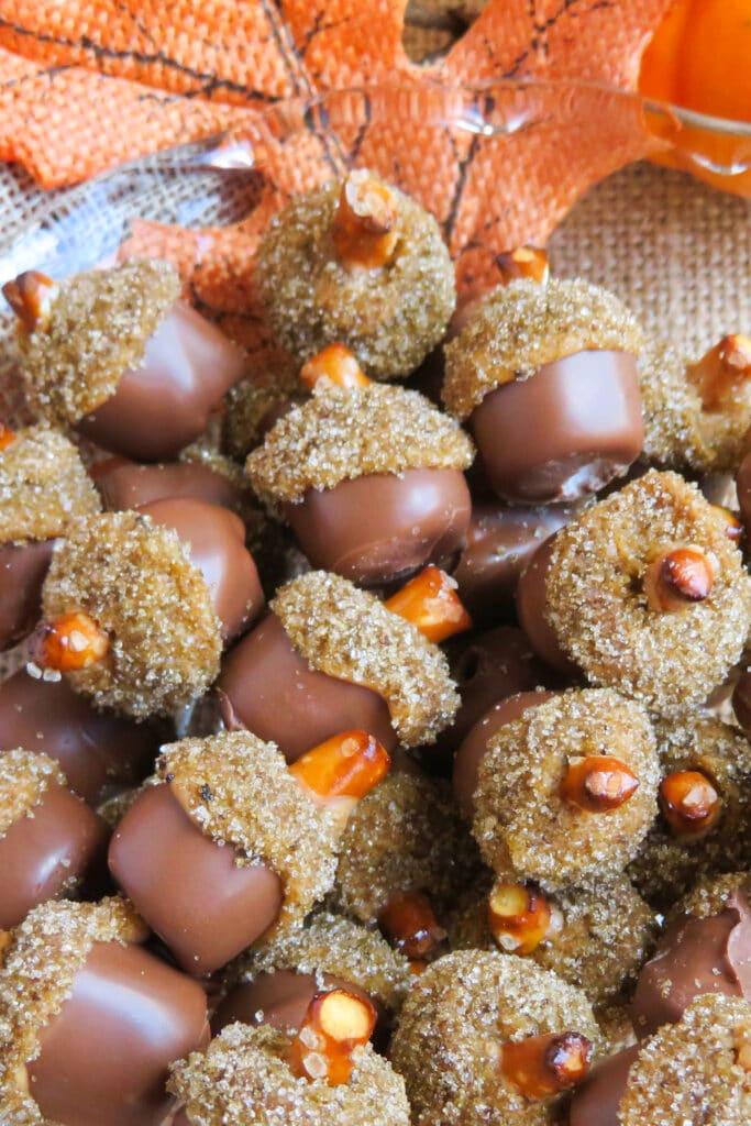 chocolate dipped fall acorn treats on serving platter