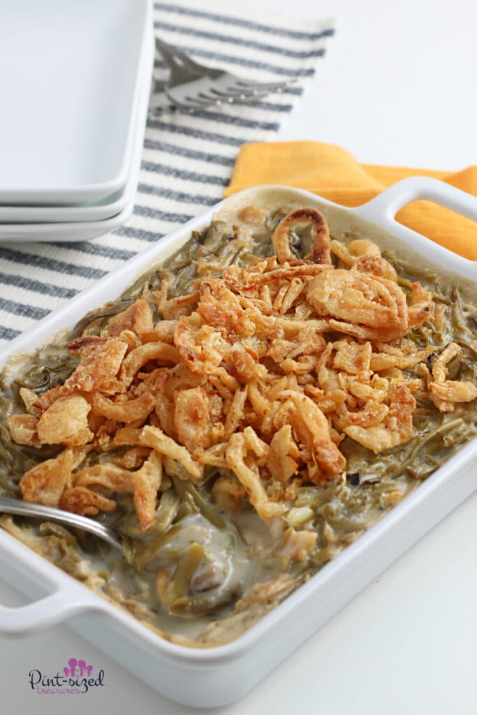 green bean casserole in white baking dish