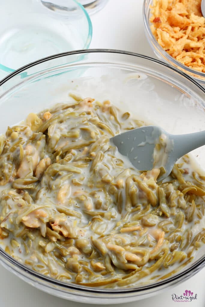onions and green beans in bowl for the green bean casserole