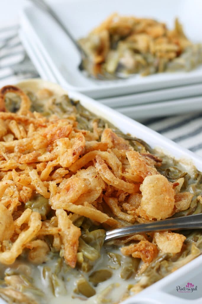 scooping out some green bean casserole