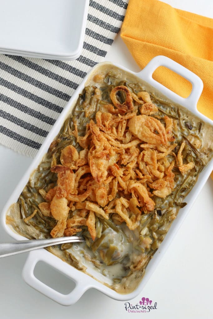 green bean casserole in white baking dish