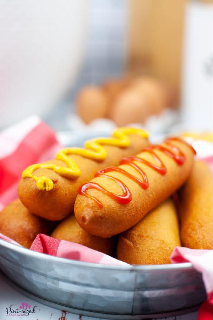 homemade corn dogs in silver serving tray