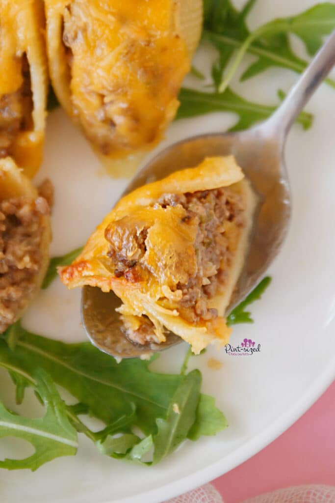a spoonful of cheeseburger shells