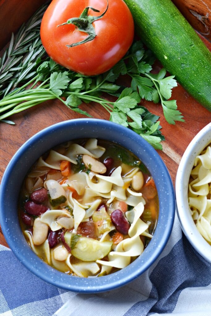 minestrone soup in blue bowl
