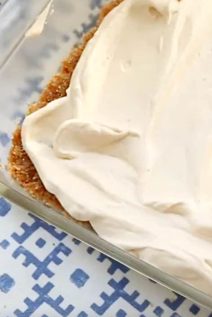 pumpkin dessert lasagna in glass casserole dish
