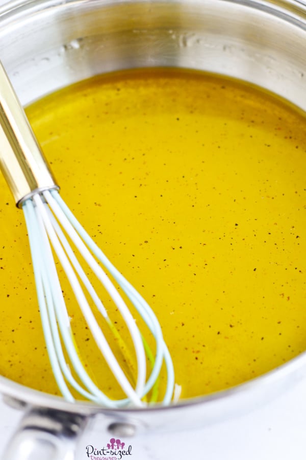whisking the dressing for the cowboy caviar