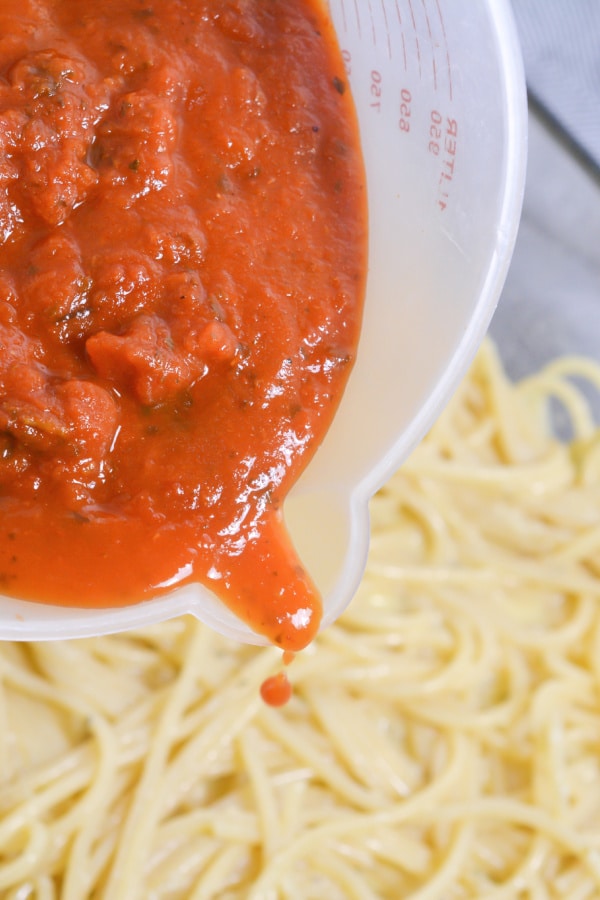 pouring sauce for pizza casserole