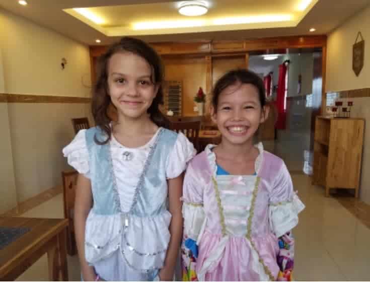 girls playing dress up