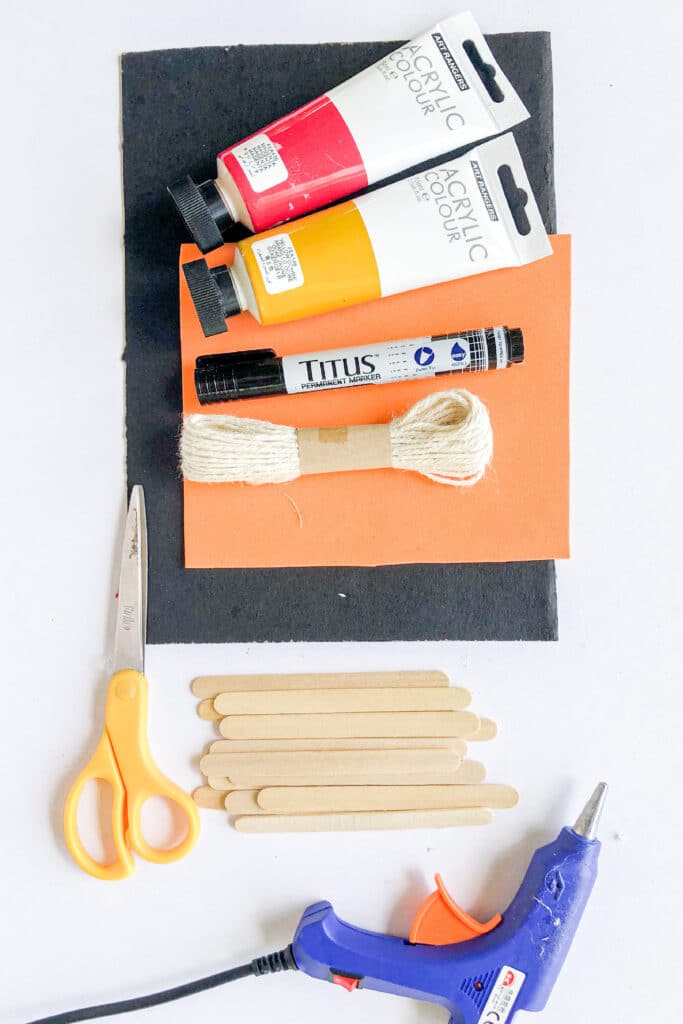 materials needed to make popsicle scarecrows
