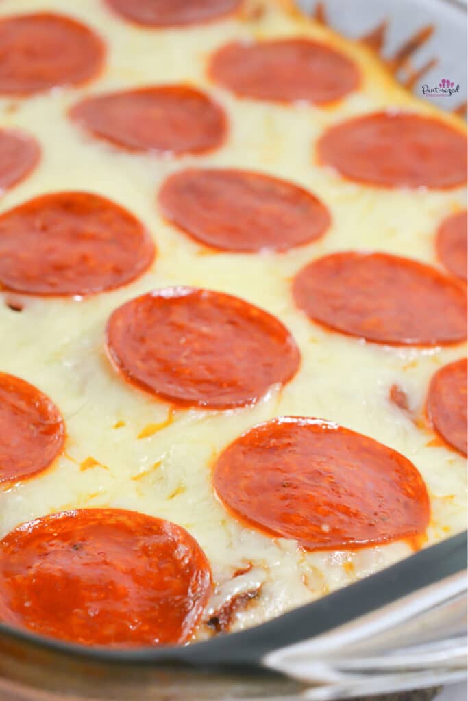 pizza casserole with loads of cheese and pepperoni