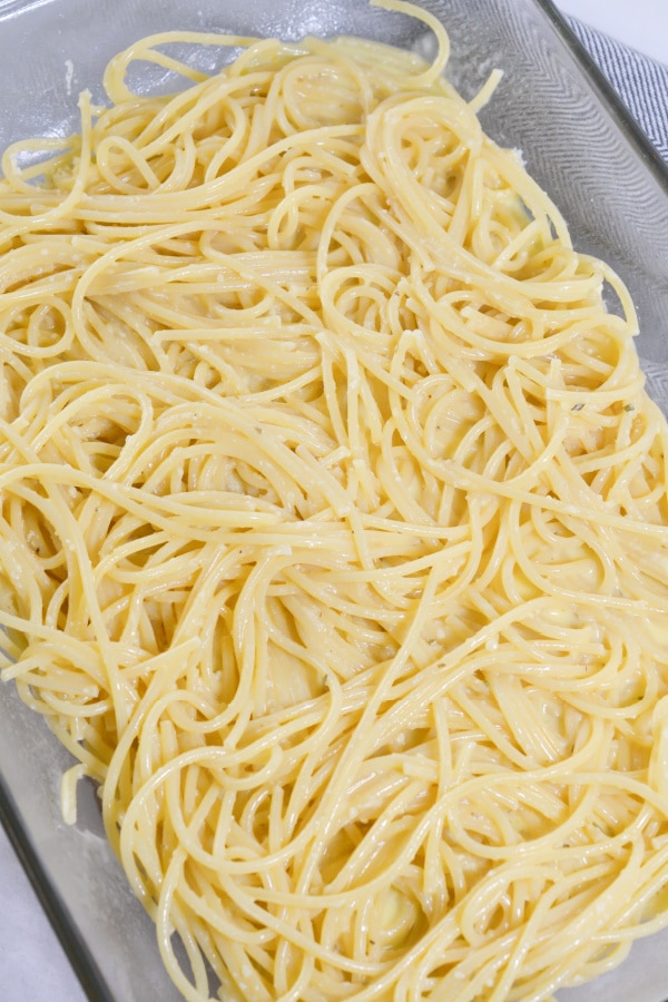 noddles and creamy cheese mixture combined for pizza casserole