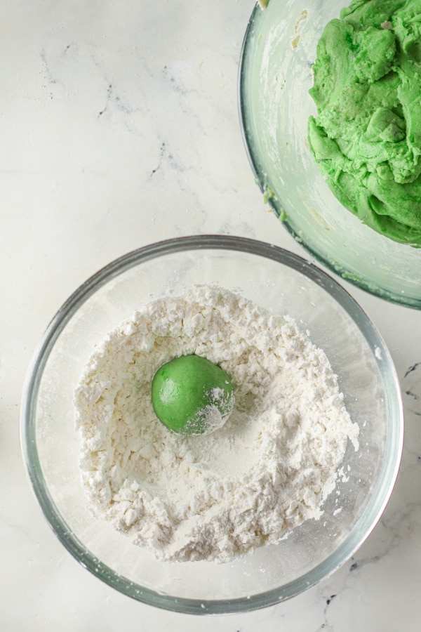 making balls of grinch cookies