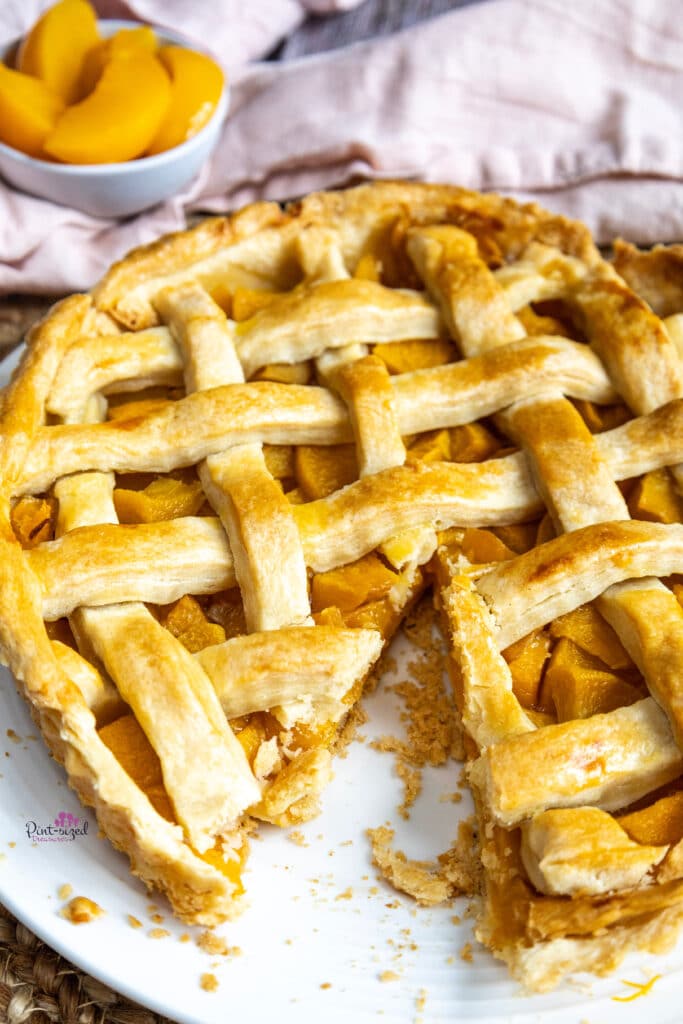 homemade peach pie baked and ready to eat